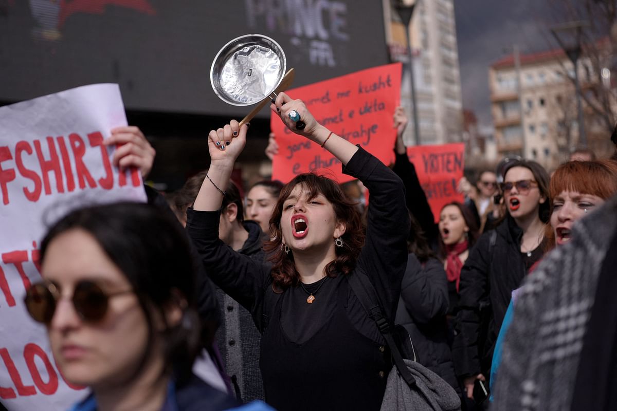 Women take part in a rally for gender equality and against violence towards women to mark the International Women's Day in Pristina. Credit: AFP Photo