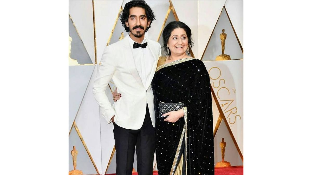 Dev Patel was seen walking the red carpet of the 89th Academy Awards in a black & white tuxedo suit paired with a black bow tie. He attended the awards ceremony with his mother. Credit: Instagram/@devpatelworld