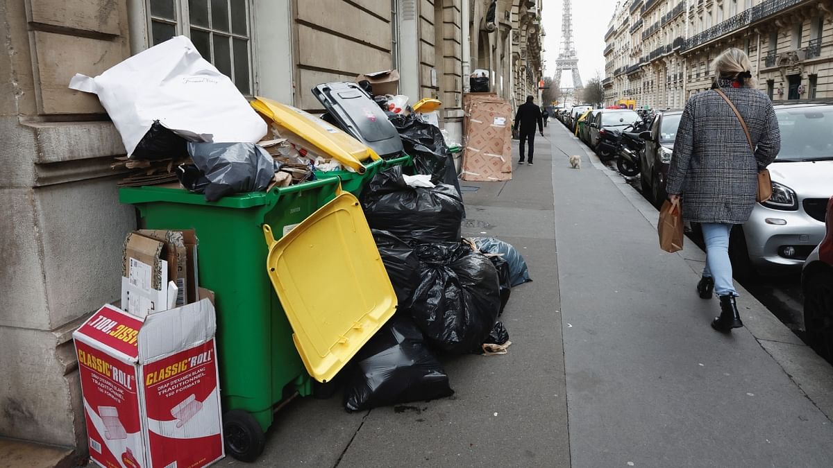 French streets are now starting to stink as garbage piles up everywhere, including alleyways and city centers. Macron's government argues that raising the retirement age from 62 to 64, abolishing privileges enjoyed by employees in some sectors, and stiffening the requirements for a full pension are required to balance the pension system. Credit: Reuters Photo