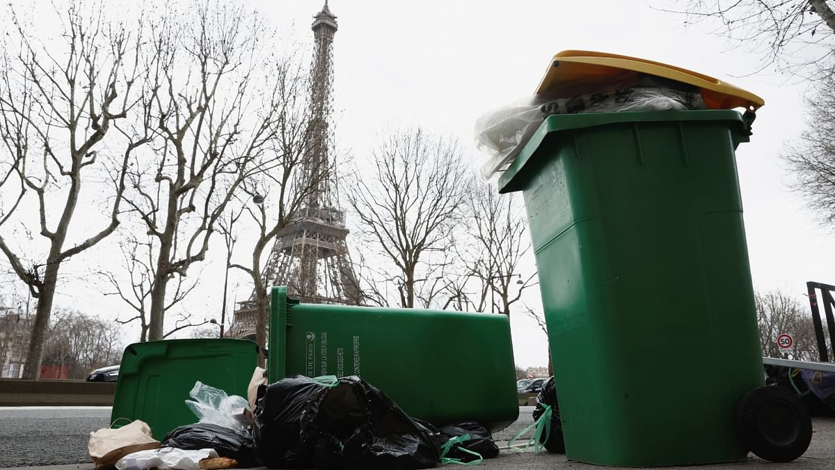 Influential French trade union CGT called on garbage collectors to join rolling strikes against President Emmanuel Macron's pension reform, in a bid to 'bring France to a standstill', causing rubbish to pile up in the streets. Credit: Reuters Photo