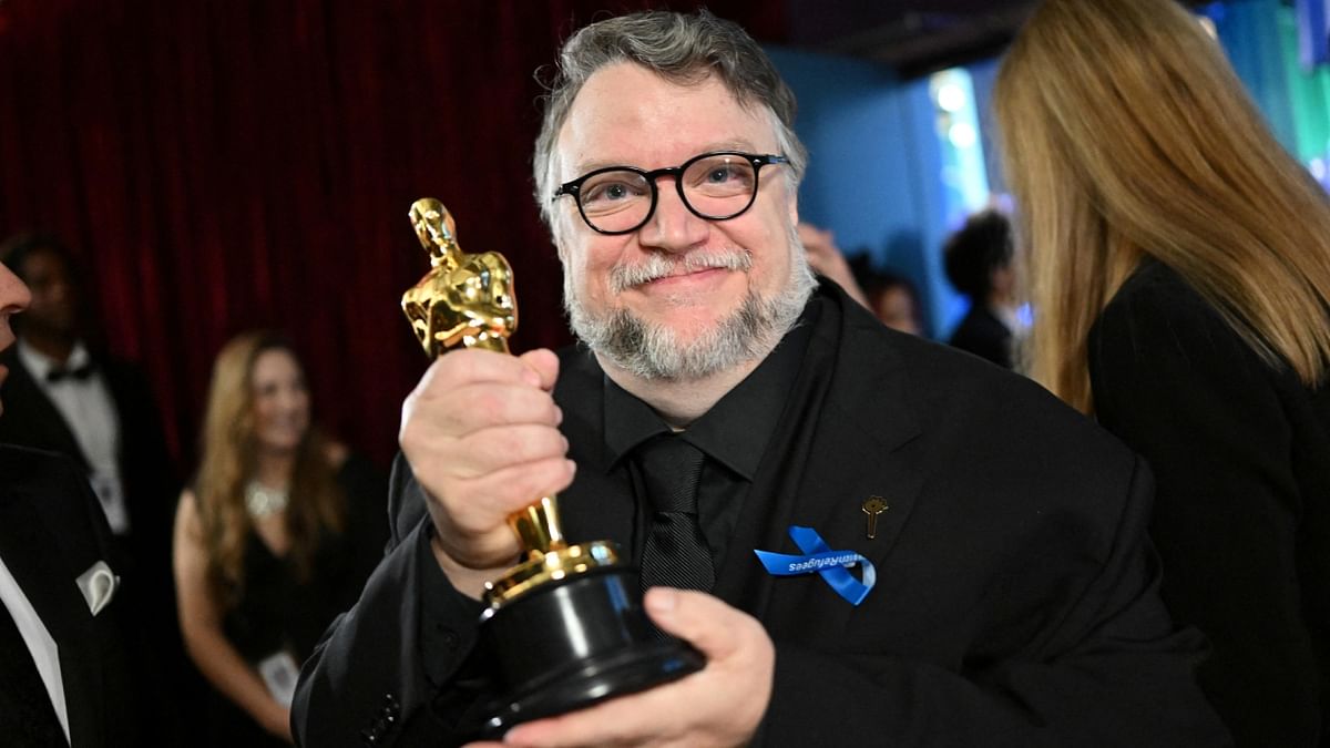 Guillermo del Toro became the first person in history to win an Academy Award for Best Picture, Best Director, and Best Animated Feature. He triumphed with his macabre reimagining of Pinocchio's adventures set in 1930s Italy. Credit: Reuters Photo