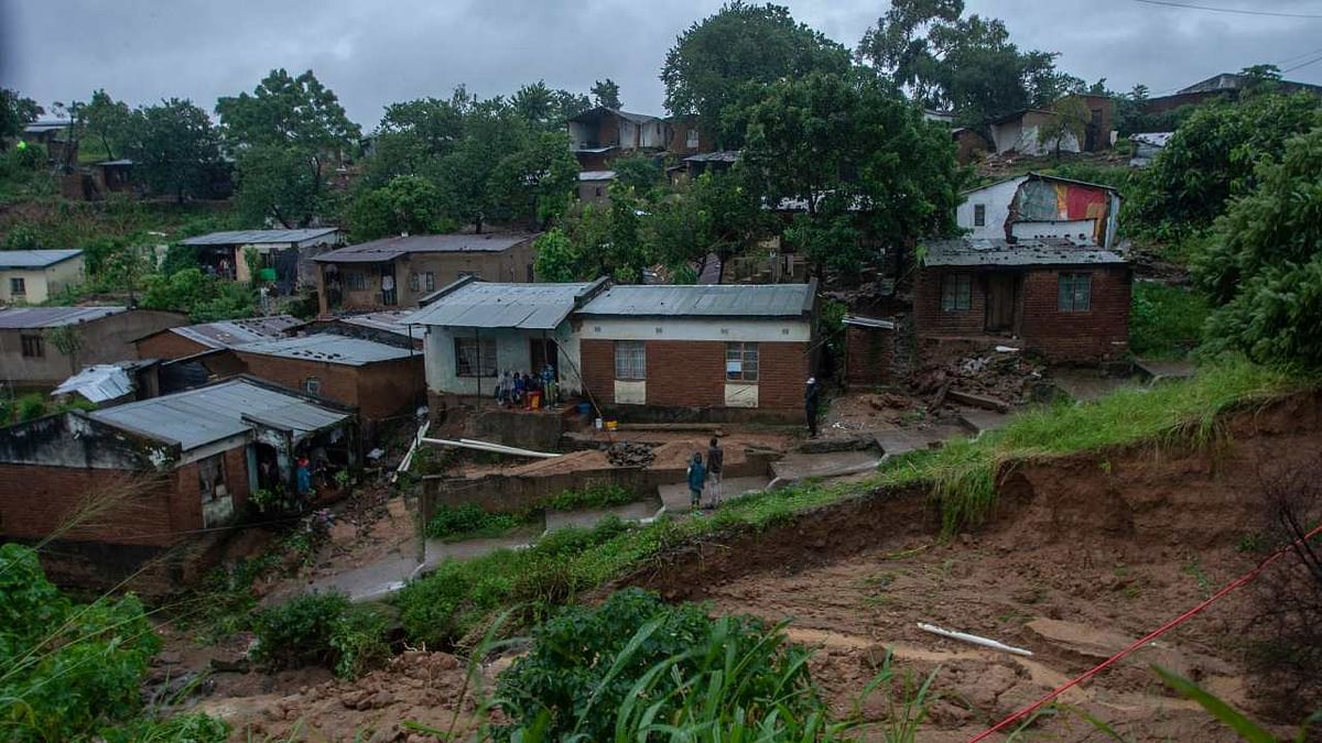 A general view of a collapsed embankment caused by flooding waters due to heavy rains following cyclone Freddy in Blantyre, Malawi. Credit: AFP Photo