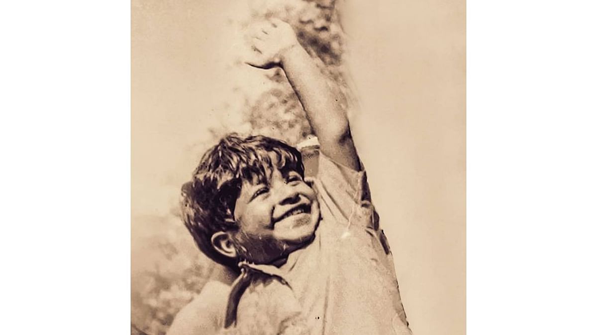 An adorable picture of young Puneeth Rajkumar. Credit: Instagram/puneethrajkumar.official