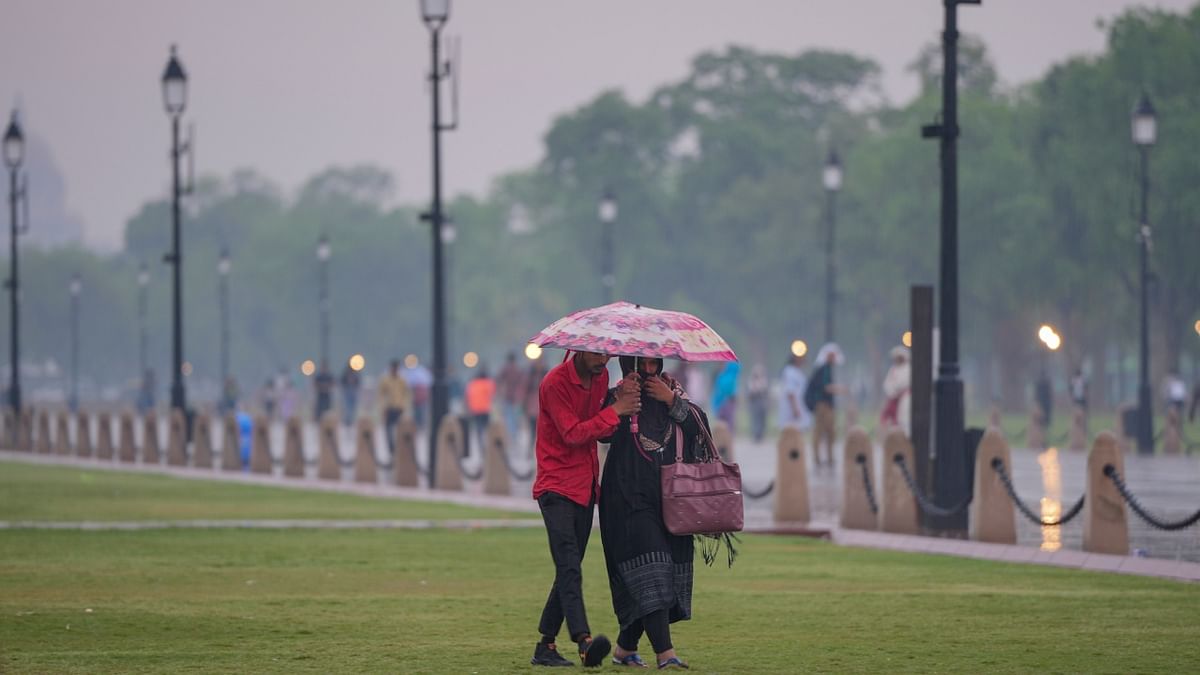 The rain was accompanied by gusty winds reaching speeds up to 32 kilometres per hour and thunderstorms, the weather office said. Credit: PTI Photo