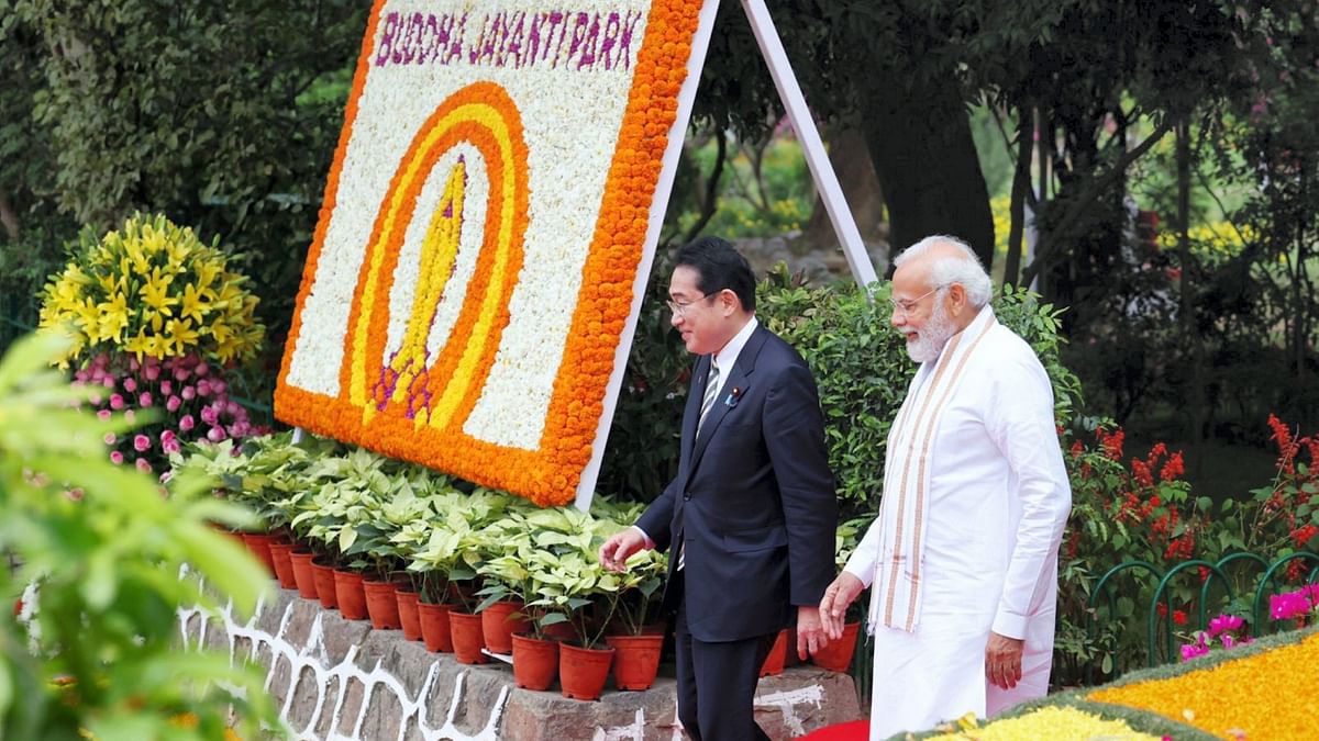 Modi and Kishida continued their talks beyond the closed doors of meeting rooms as they took a stroll around the park which was developed to celebrate the 2,500th anniversary of Gautam Buddha's birth. Credit: PTI Photo