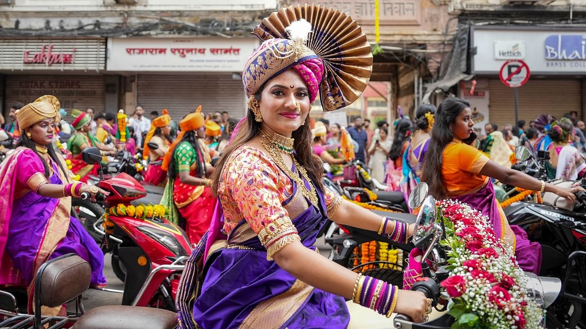 Women in traditional attire take part in a procession to celebrate the Marathi New Year, 'Gudi Padwa', at Girgaon in Mumbai. Credit: PTI Photo