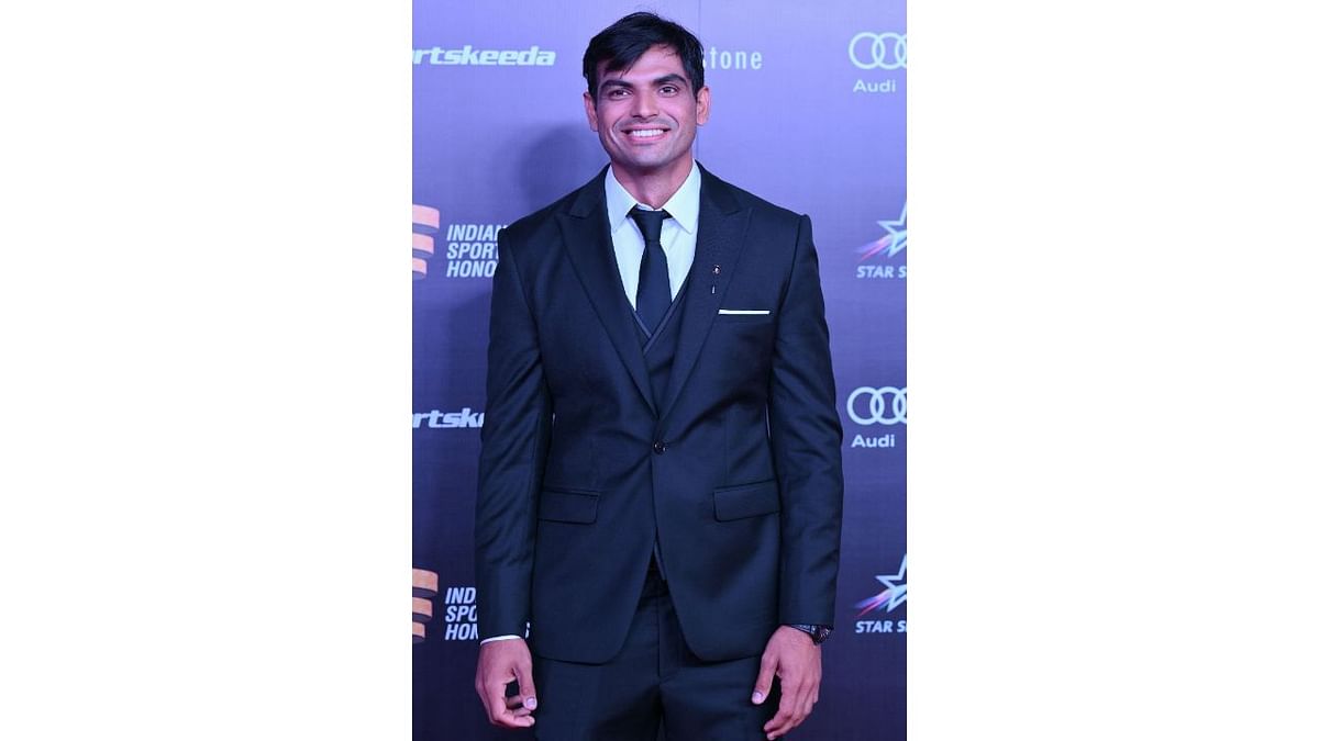 Olympic gold medallist Neeraj Chopra is all smiles at the 'Indian Sports Honours'. Credit: AFP Photo