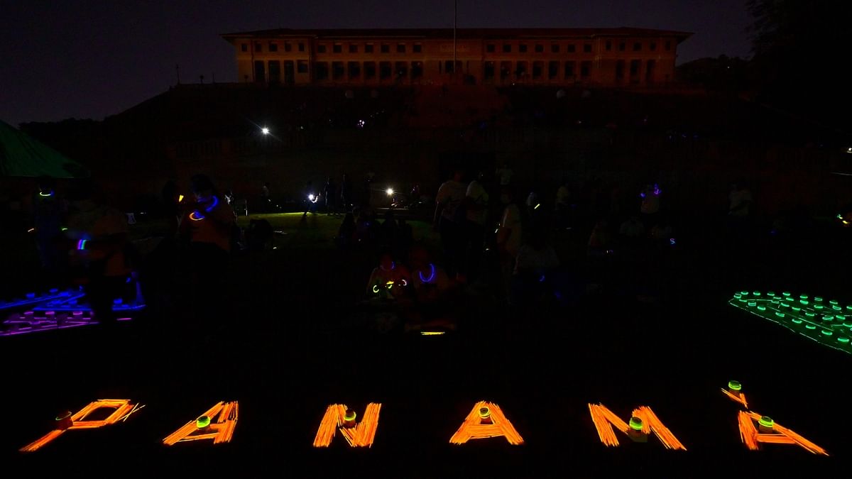 Panama's canal administration building is pictured as lights are turned off for Earth Hour environmental campaign in Panama City, Panama. Credit: AFP Photo