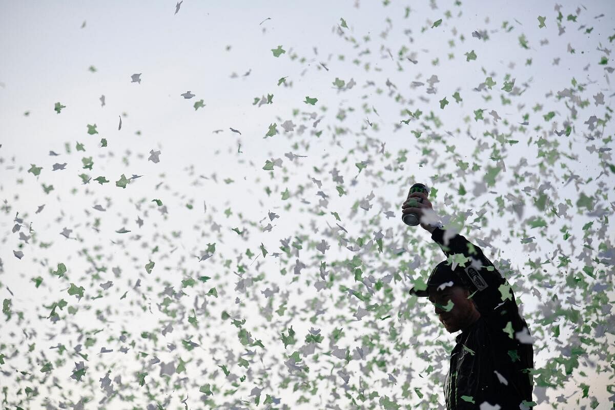 Tyler Reddick, driver of the #45 Monster Energy Toyota, celebrates in victory lane after winning the NASCAR Cup Series. Credit: Getty via AFP
