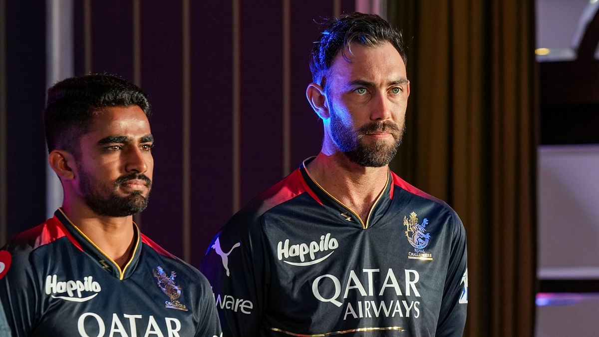 RCB players Mahipal Lomror and Glen Maxwell snapped during the event in Bengaluru. Credit: PTI Photo
