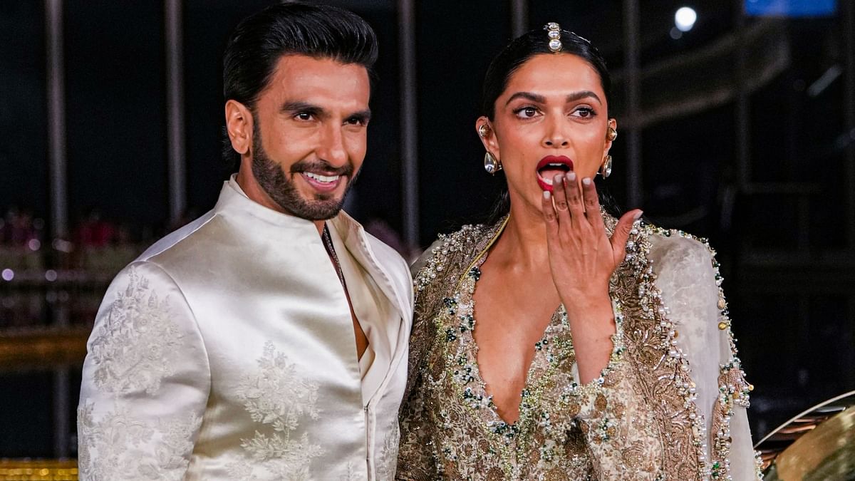 Celebrity couple Ranveer Singh and Deepika Padukone got clicked arriving at the event, looking dapper as usual. PTI Photo