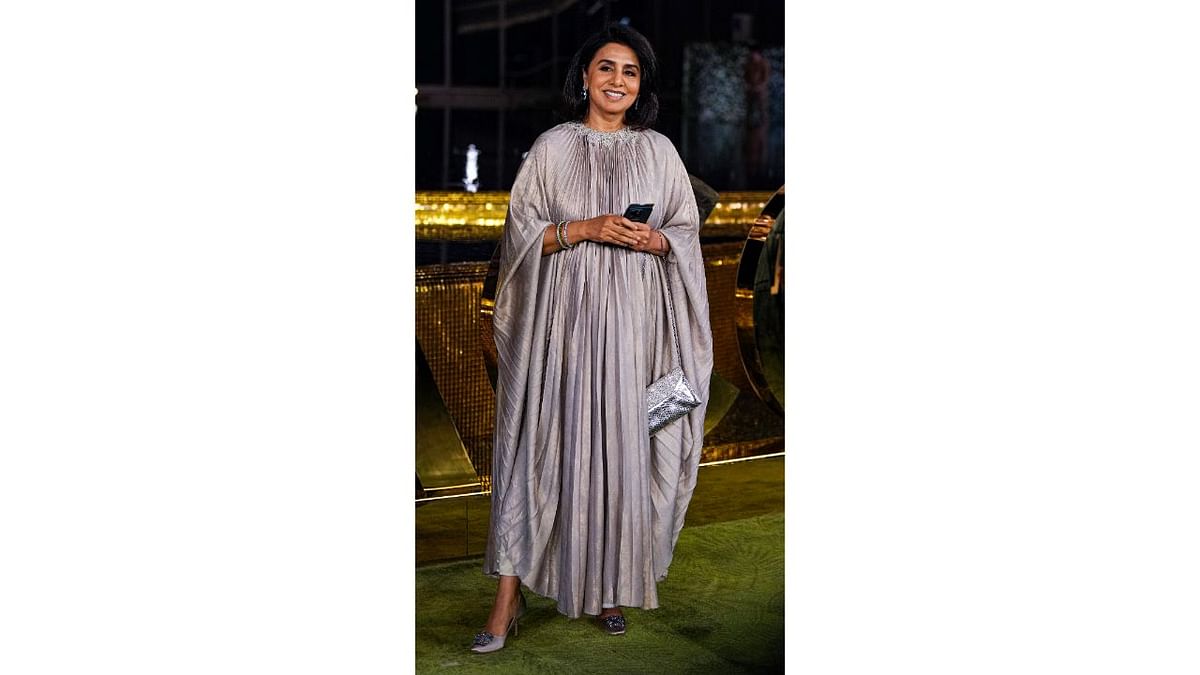 Veteran Bollywood actress Neetu Singh attended the dressed in an indo-western looking adding glamour to the starry night. Credit: PTI Photo