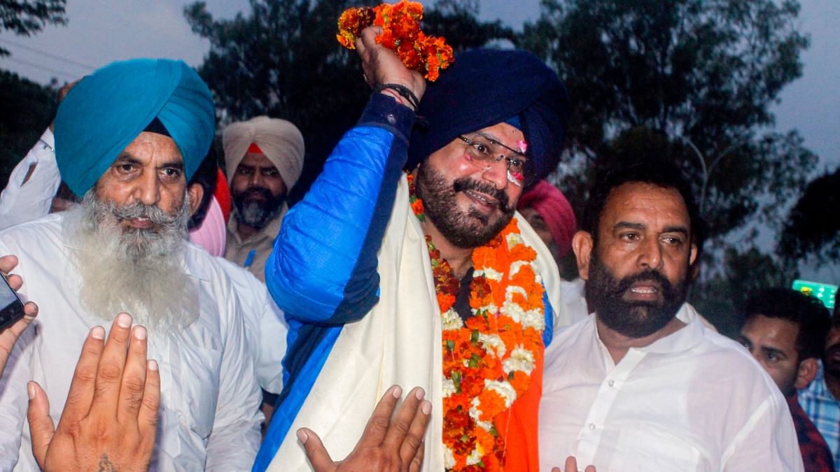 After remaining behind bars for 317 days at Patiala jail in a 1988 road rage case, Congress leader Navjot Singh Sidhu walked out on April 1 and slammed both the state AAP government and the BJP government at the Centre. Credit: PTI Photo