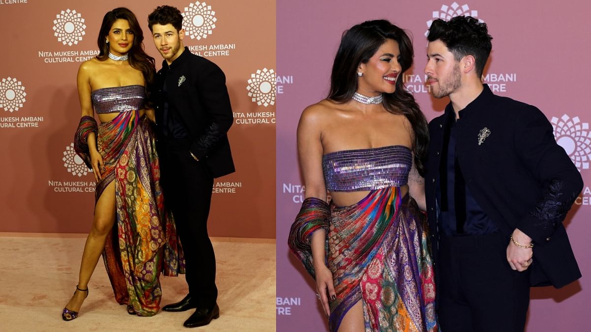 Priyanka Chopra Jonas wore a strapless gown made with banarasi saree accompanied with a choker and studs in the ear while her beloved husband Nick Jonas opted for a navy blue suit for the star-studded event. Credit: PTI & Reuters Photo