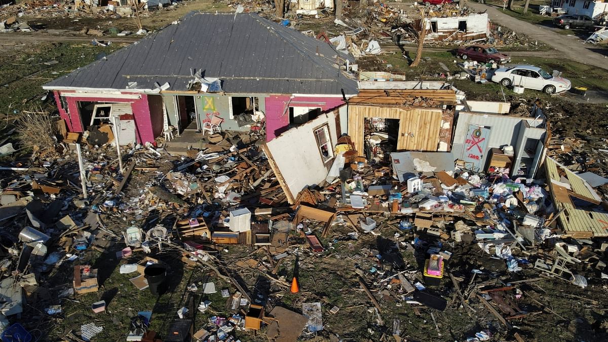 Two severely damaged homes are seen in a neighbourhood in the aftermath of a tornado in Sullivan, Indiana, US. Credit: Reuters Photo