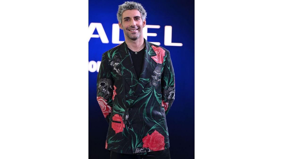 'Rocket Boys' star Jim Sarbh donned black t-shirt paired, black pants and broke the monotony with a floral-skull print blazer. He rounded up his look with salt and pepper hairdo and a light stubble. Credit: AFP Photo