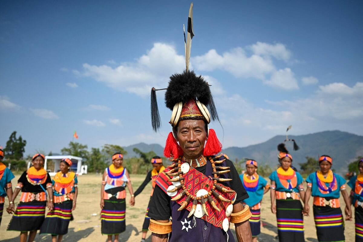 The Konyaks perform their tribal dance in Longwa village, in the northeast Indian state of Nagaland. Credit: AFP Photo