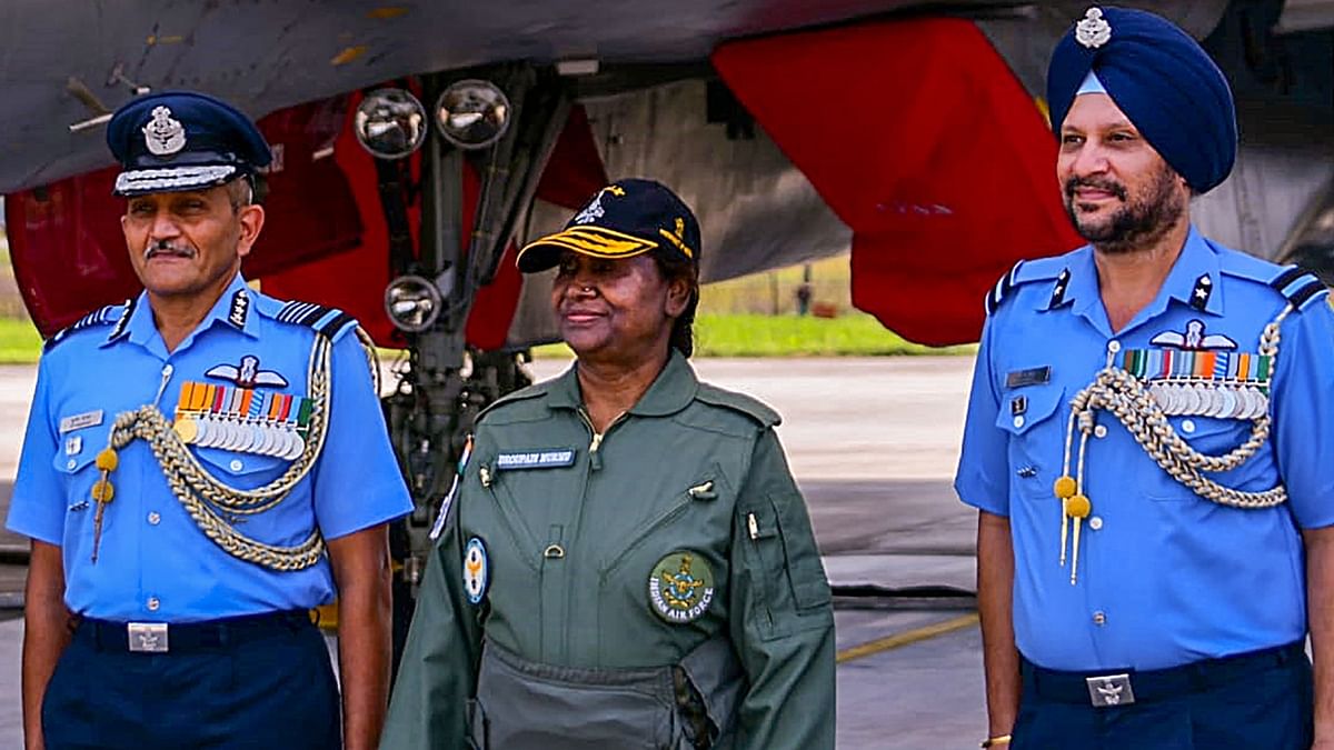 On reaching Tezpur, Murmu received a guard of honour from IAF personnel, followed by an official briefing on her flight aboard the Sukhoi aircraft. Credit: PTI Photo