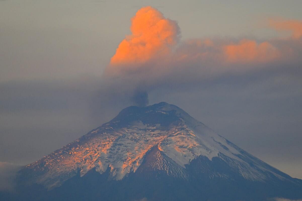 A plume of steam and gas billows from the Cotopaxi volcano as seen from Quito. credit: AFP Photo