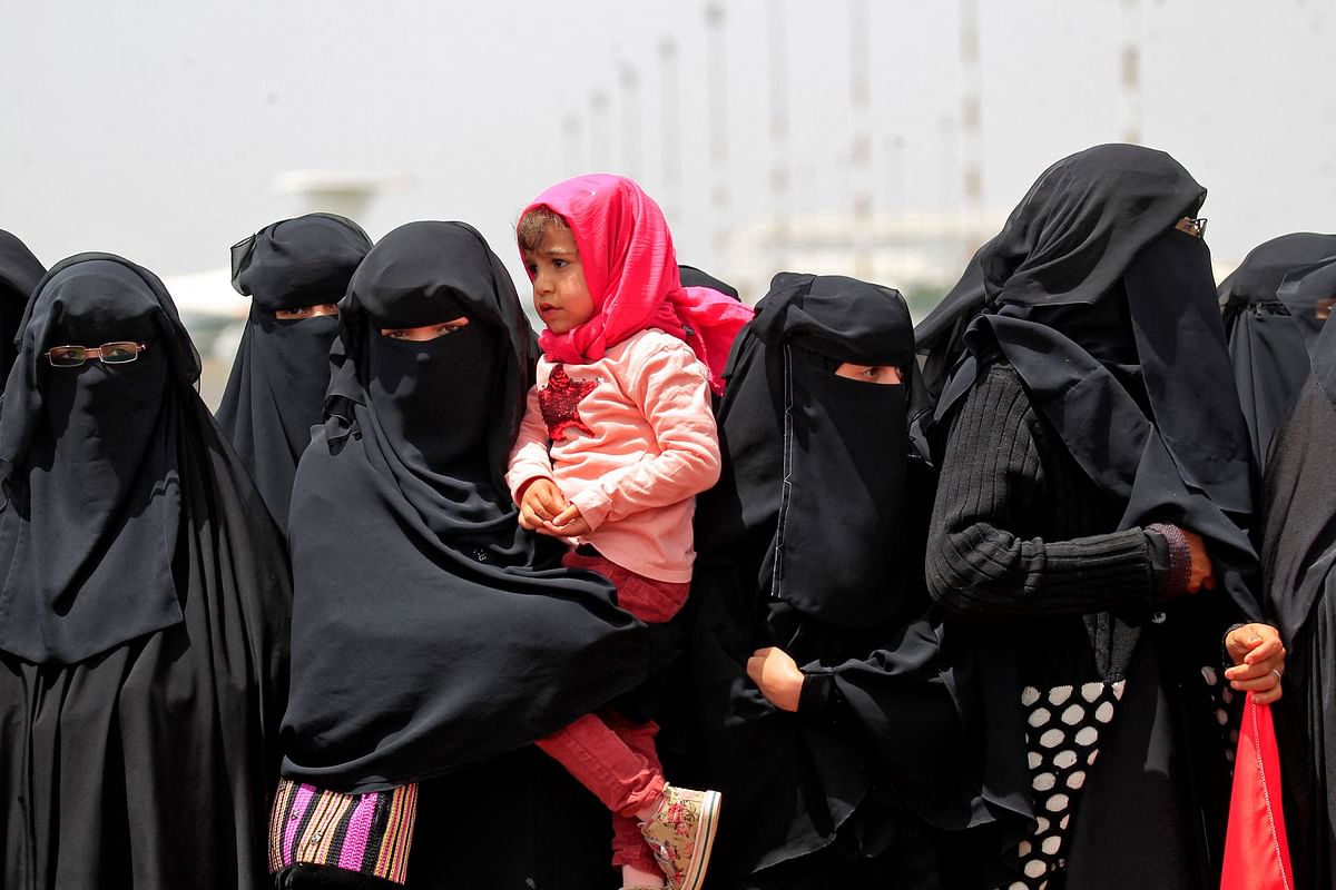 Women wait at Sanaa airport for the arrival of Yemeni Huthi rebels who have been recently released. Credit: AFP Photo