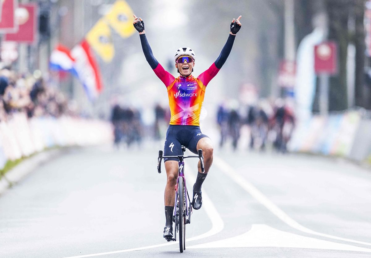 Dutch cyclist Demi Vollering celebrates after winning the Women's Amstel Gold Cycling Race 2023. Credit: AFP Photo