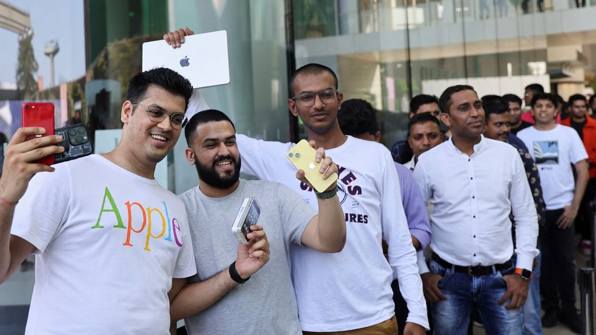 Apple enthusiasts have been waiting in long queues outside the BKC store hours before the official inauguration by CEO Tim Cook scheduled at 11:00 am. Credit: Reuters Photo