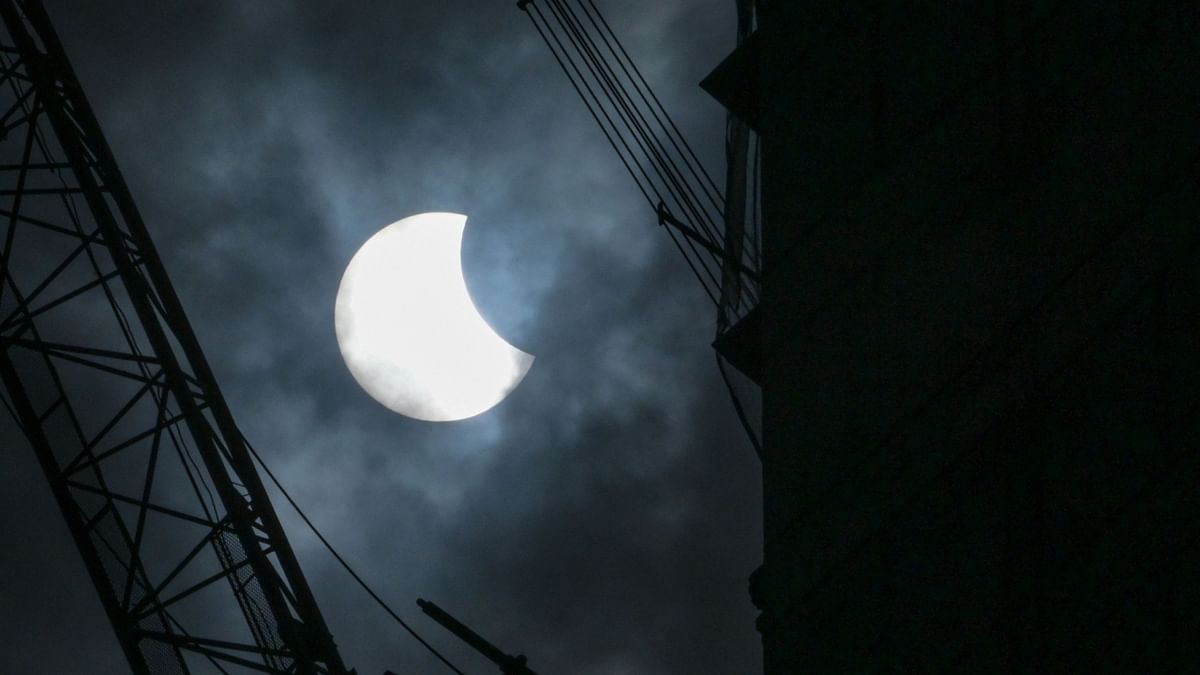 A general view showing a partial solar eclipse in Jakarta. Credit: AFP Photo