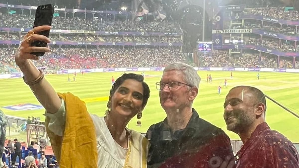 Sonam Kapoor clicks a selfie with Apple CEO Tim Cook and her husband Anand Ahuja. Credit: Instagram/@sonamkapoor