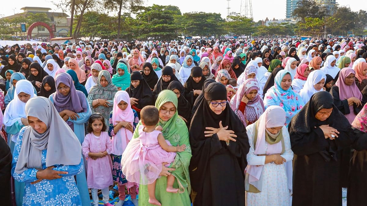 Muslims offer 'namaz' on the occasion of Eid-ul-Fitr, at Eidgah in Kozhikode, Kerala. Credit: PTI Photo