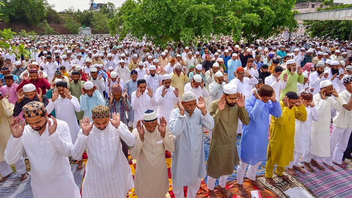 Muslims offer prayers on the occasion of Eid-ul-Fitr festival, at Eidgah, in Prayagraj, Uttar Pradesh. Credit: PTI Photo