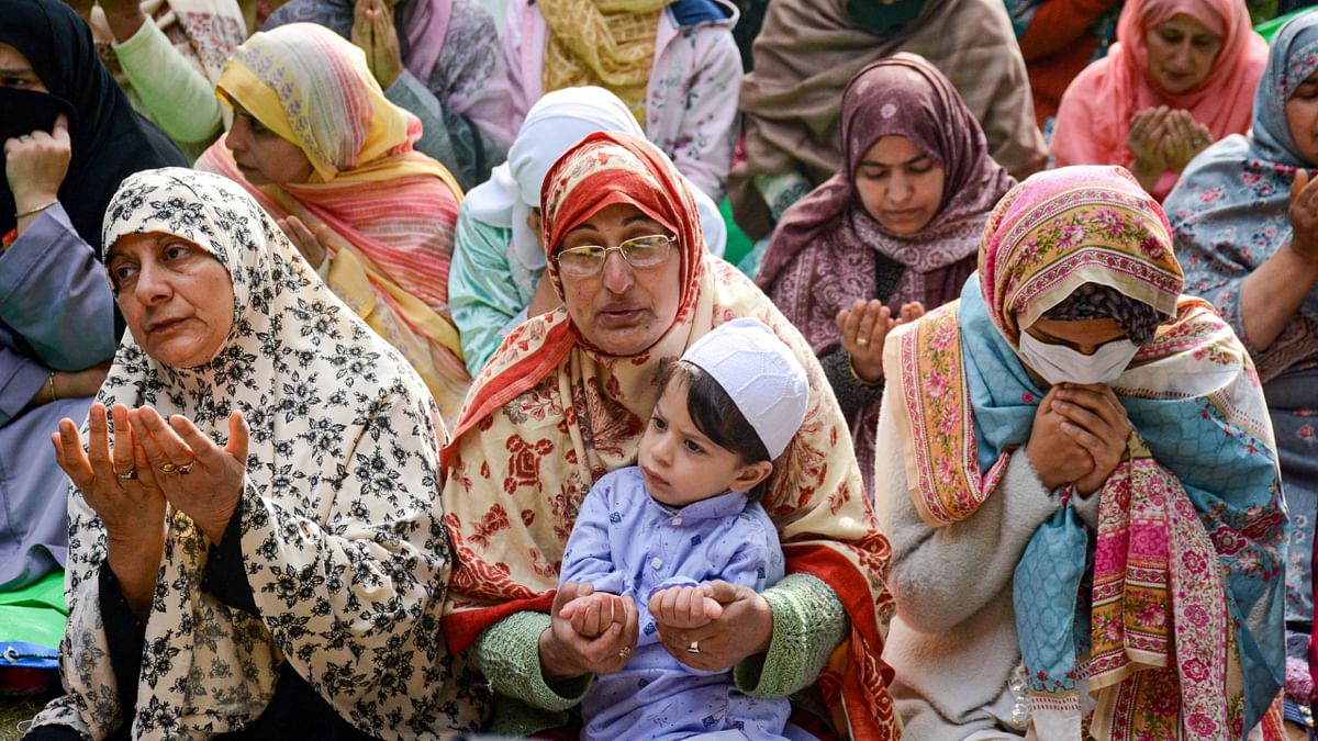 Muslim women offer Eid Namaz during Eid-ul-Fitr celebrations, at Ali Masjid in Srinagar, Jammu and Kashmir. Credit: PTI Photo