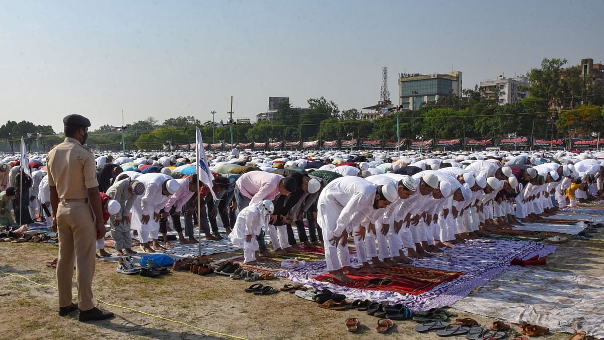 Muslims offer prayers on the occasion of Eid-ul-Fitr, at Gandhi Maidan in Patna, Bihar. Credit: PTI Photo