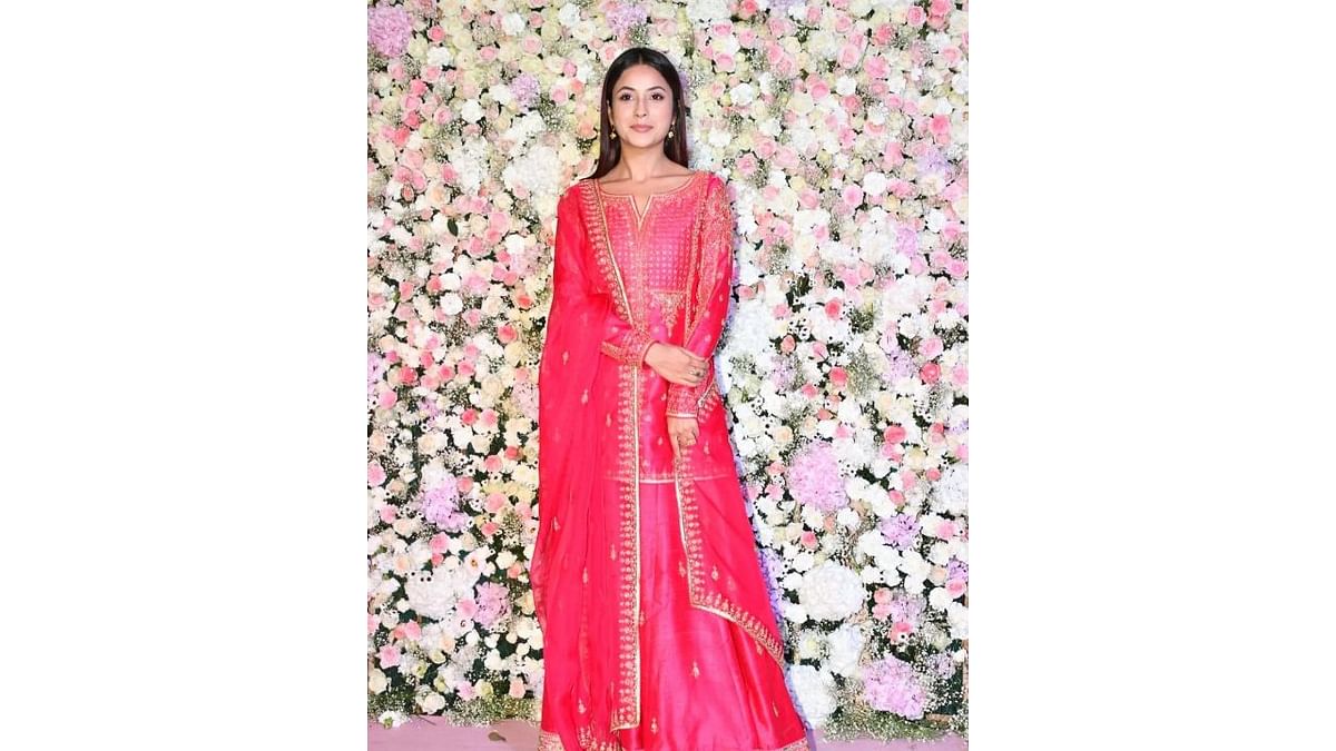 Actress Shehnaaz Gill wowed everyone in a red suit at the Eid party. Credit: Special Arrangement