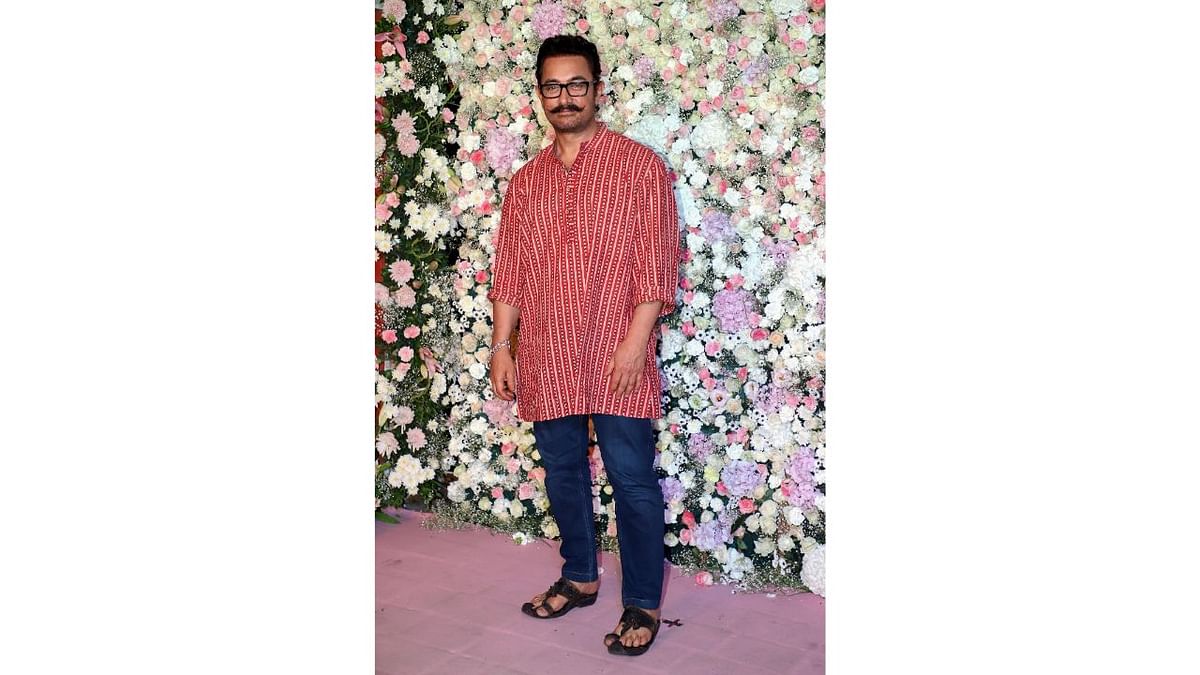 Bollywood's 'Mr. Perfectionist' Aamir Khan was seen wearing a red coloured kurta at the party. Credit: PTI Photo