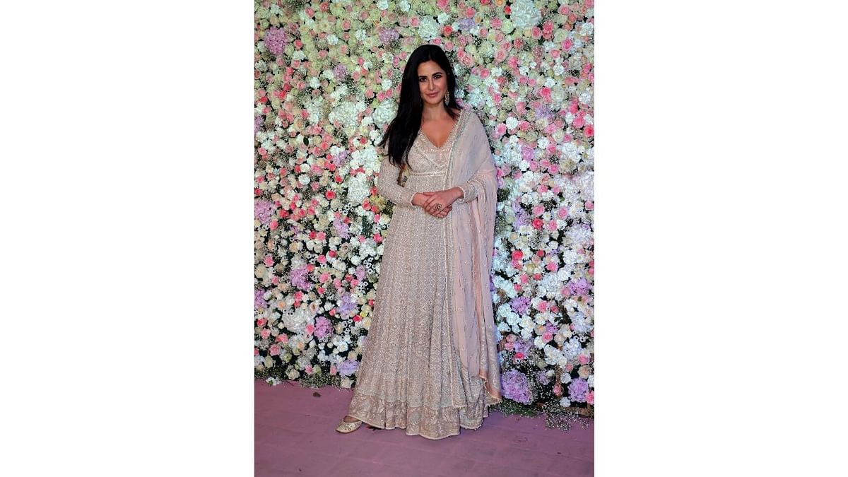 Katrina Kaif donned white and golden anarkali suit with full sleeves and flared bottom. Credit: PTI Photo