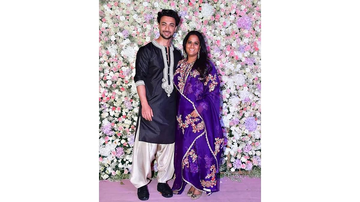 Hosts Aayush Sharma poses with his wife Arpita Khan Sharma at their Eid party. Credit: Special Arrangement