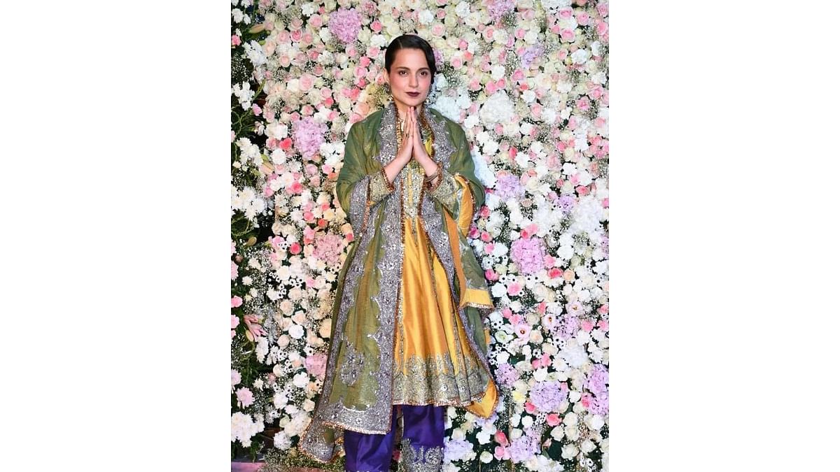 Bollywood's 'Queen' Kangana Ranaut gave a regal look in a yellow and blue suit which she paired with golden juttis and a green dupatta. Credit: Special Arrangement