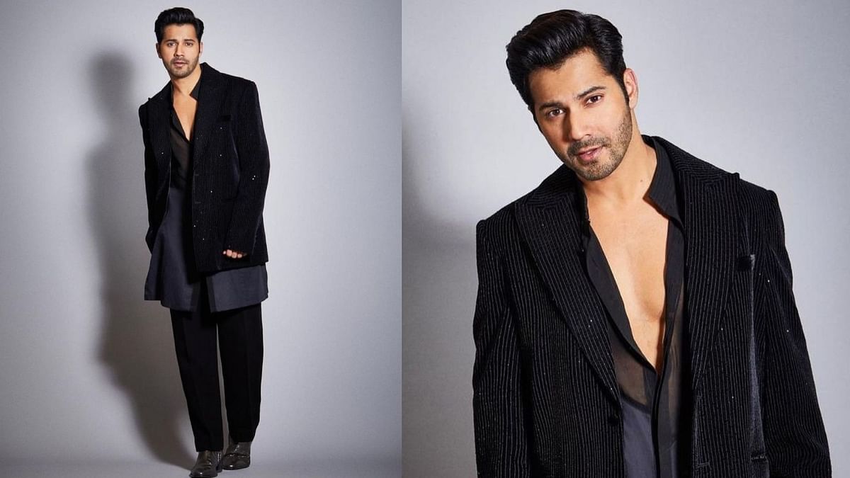 Varun Dhawan: Black is the new navy when it comes to picking traditional outfits for the red carpet. Varun Dhawan had worn this dapper and chic Manish Malhotra outfit to the opening weekend of the Nita Mukesh Ambani Cultural Centre in Mumbai. Credit: Instagram/@varundvn