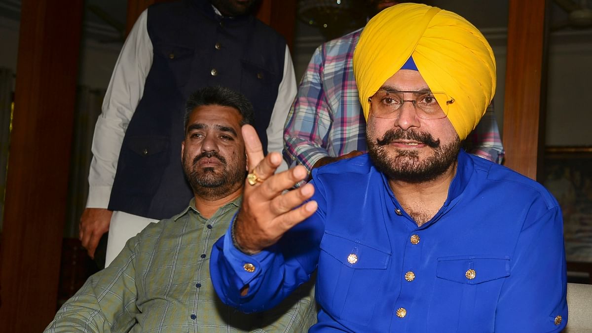 Cricketer-turned-politician Navjot Singh Sidhu also voiced his concerns and said he would join the wrestlers at Jantar Mantar on May 1. Credit: PTI Photo