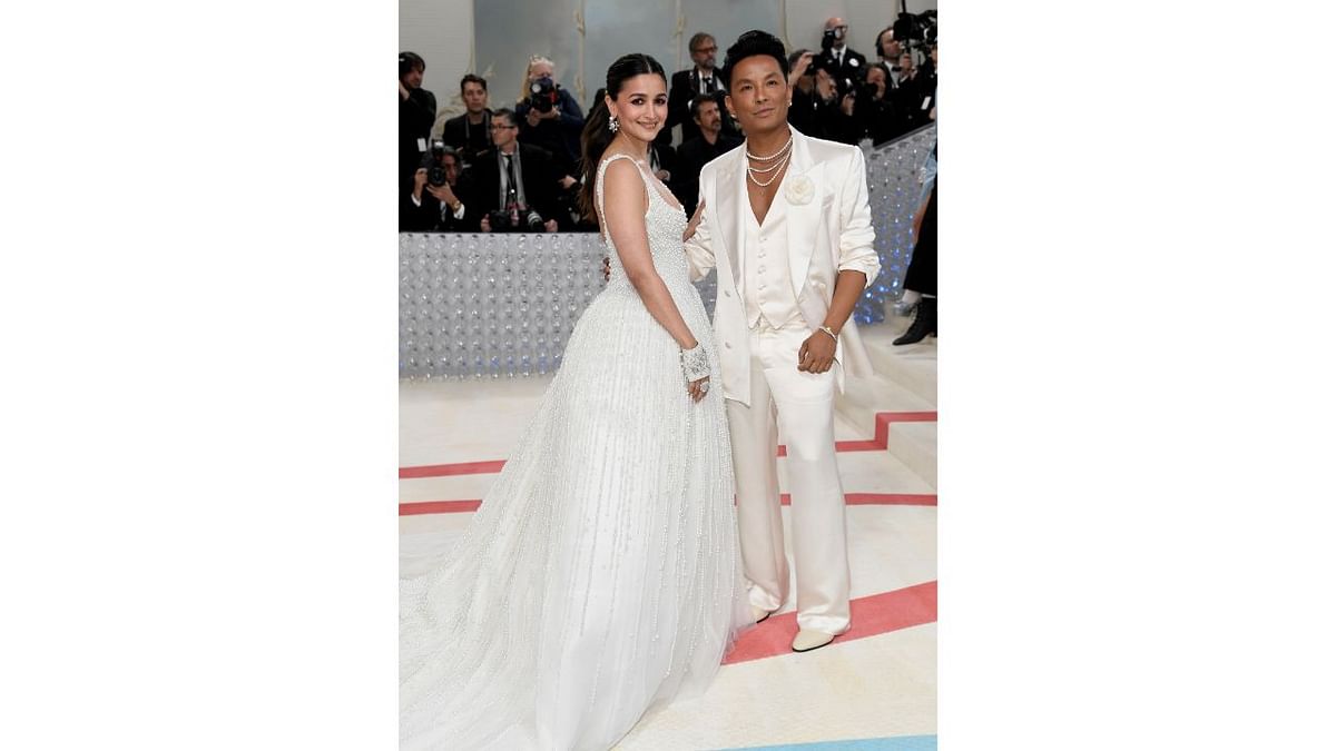 Alia Bhatt poses with designer Prabal Gurung as  she arrives for The Metropolitan Museum of Art's Costume Institute benefit gala celebrating the opening of the