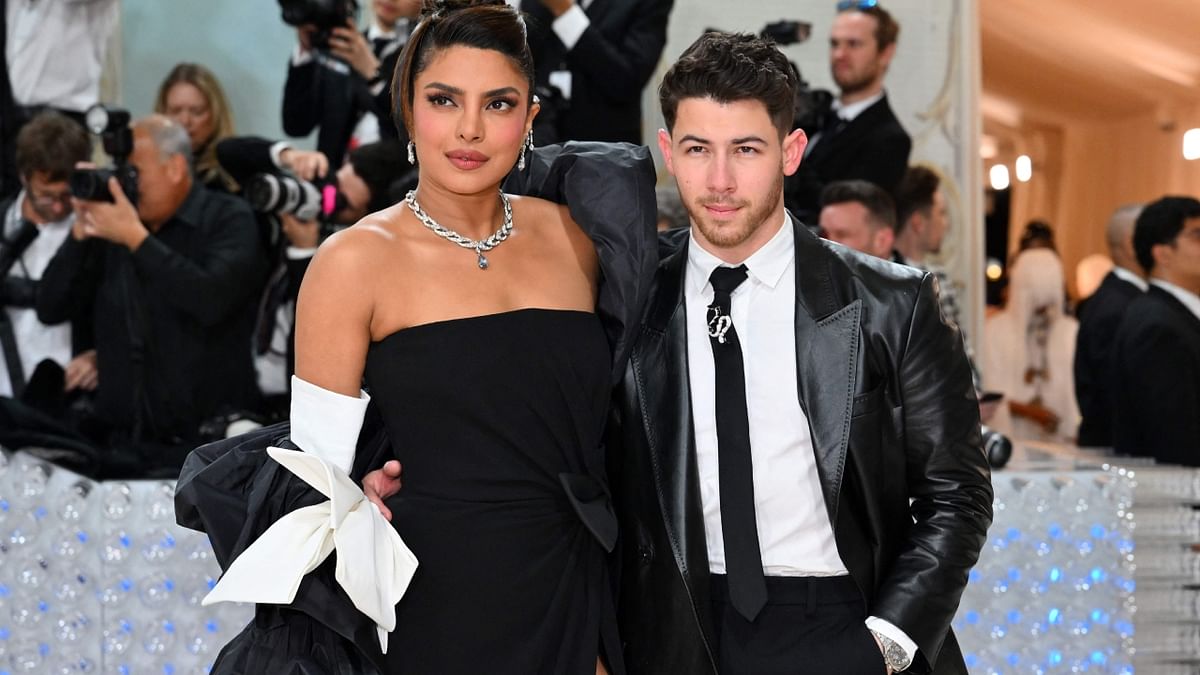 Celebrity couple Priyanka Chopra Jonas and her husband Nick Jonas opted for the colour black for their Met Gala 2023 appearance. Credit: AFP Photo