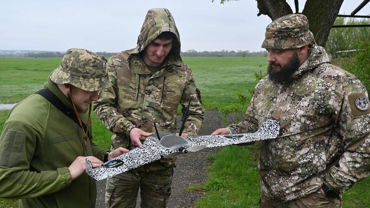 Ukrainian soldiers inspect a new Sirko reconnaissance drone outside Kharkiv amid the Russian invasion of Ukraine. Credit: AFP Photo