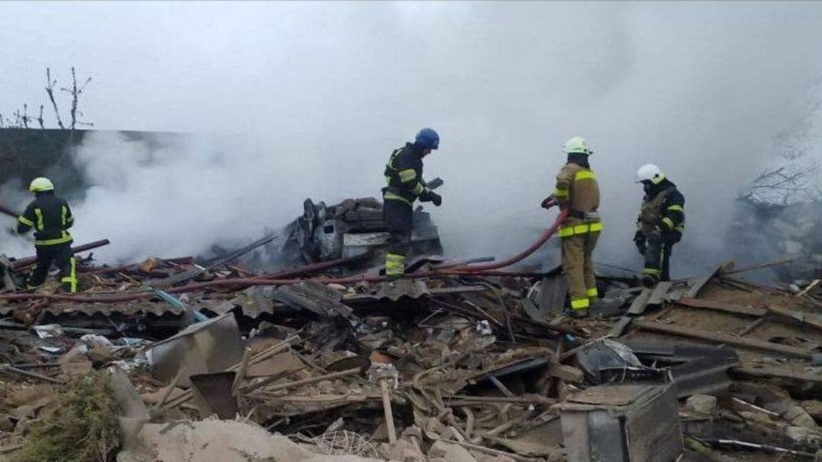 Firefighters work at the site of a residential area hit by a Russian military strike in the town of Pavlohrad, Ukraine. Credit: Reuters Photo