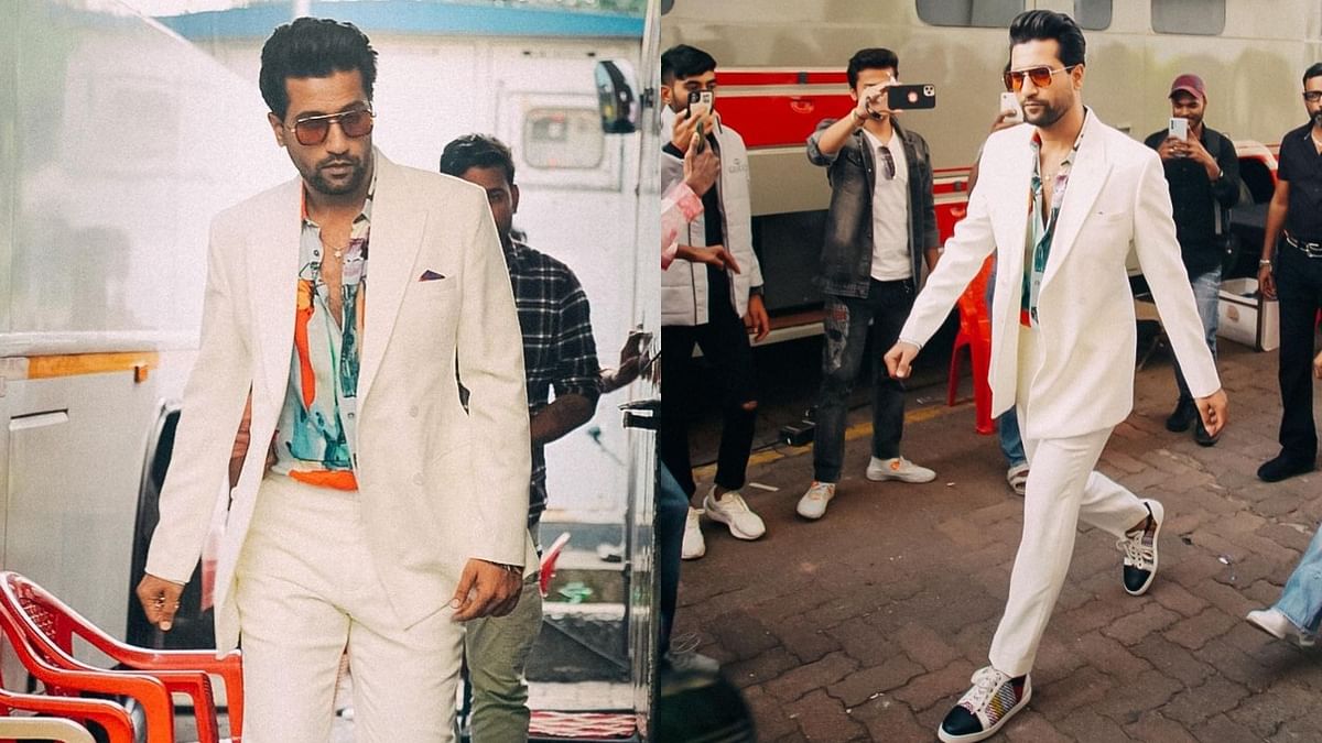 Vicky Kaushal stood out among the crowd with an intriguing abstract printed shirt underneath his white two-piece suit. Credit: Instagram/@vickykaushal09