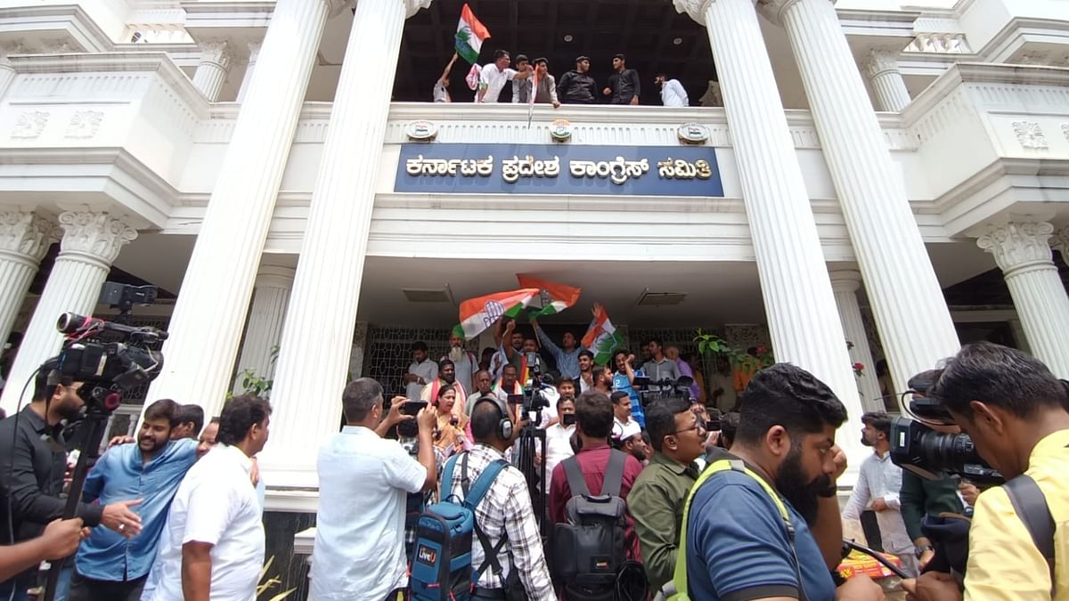 Congress leaders and workers celebrate at the party office as the party leads in early trends on the vote-counting day of Karnataka Assembly polls, in Bengaluru. Credit: Special Arrangement