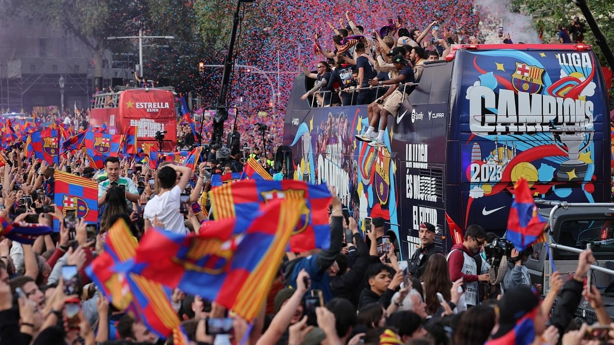 FC Barcelona players celebrate during the victory parade. Credit: Reuters Photo