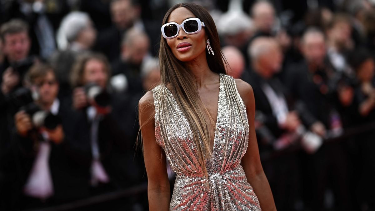Supermodel Naomi Campbell wore a sequin Celine gown with a plunging neckline on the red carpet for the opening night ceremony at the 76th Cannes Film Festival. Credit: AFP Photo