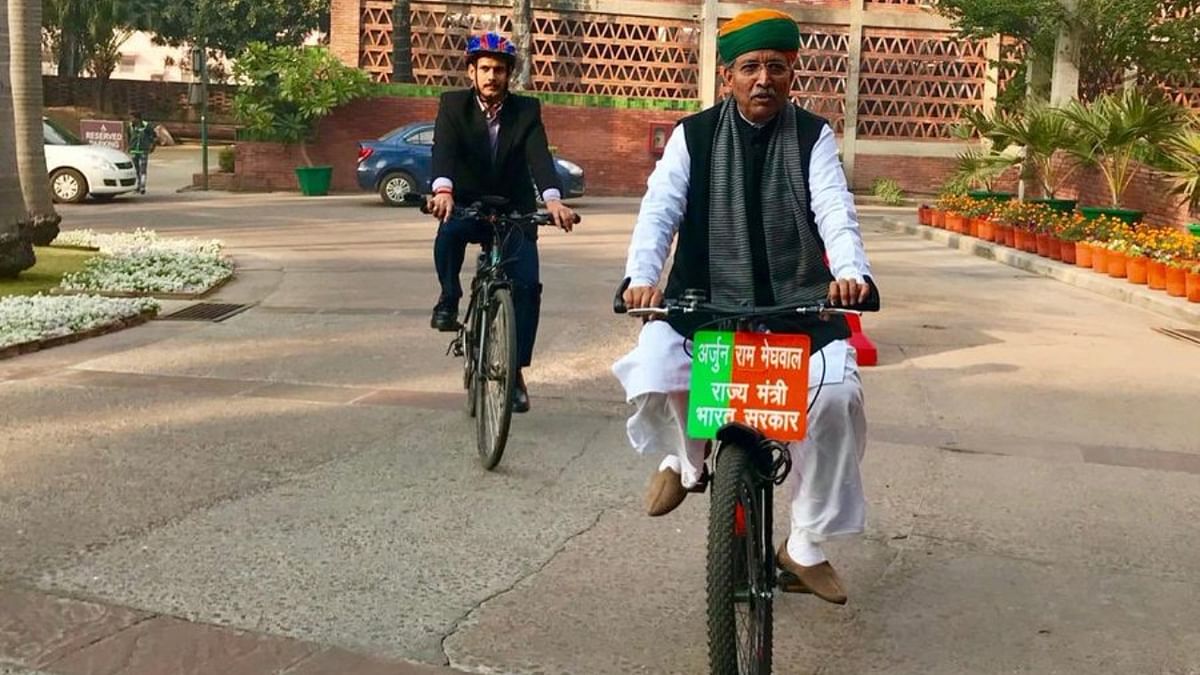 Arjun Ram Meghwal is known for cycling to the Parliament. There are several occasions where Meghwal was seen riding a bicycle to reach Lok Sabha. Credit: Twitter/@arjunrammeghwal