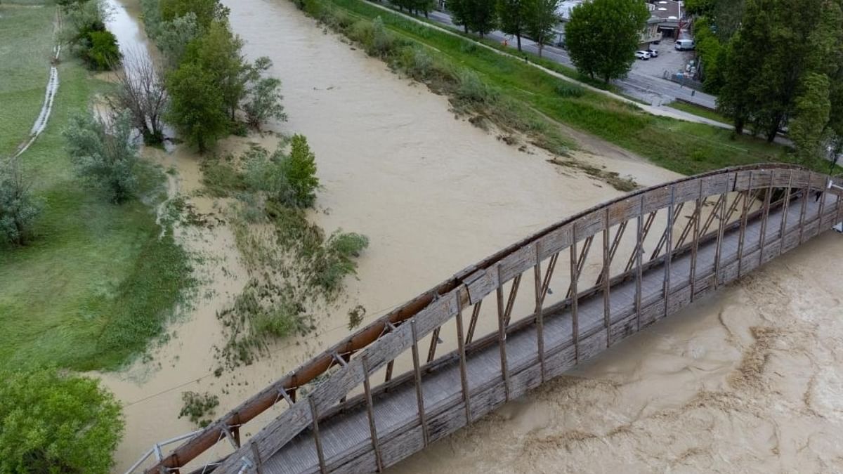 Schools were shuttered, trains in the region were cancelled, and roads and highways were closed as waters swept over large areas of land, submerging fields and some towns. Credit: IANS Photo