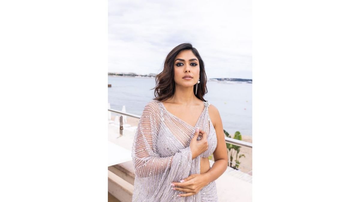 Mrunal Thakur has officially made her first of the two red carpet appearances at the 76th Cannes Film Festival marking her first appearance at the India pavilion. Credit: Instagram/@mrunalthakur
